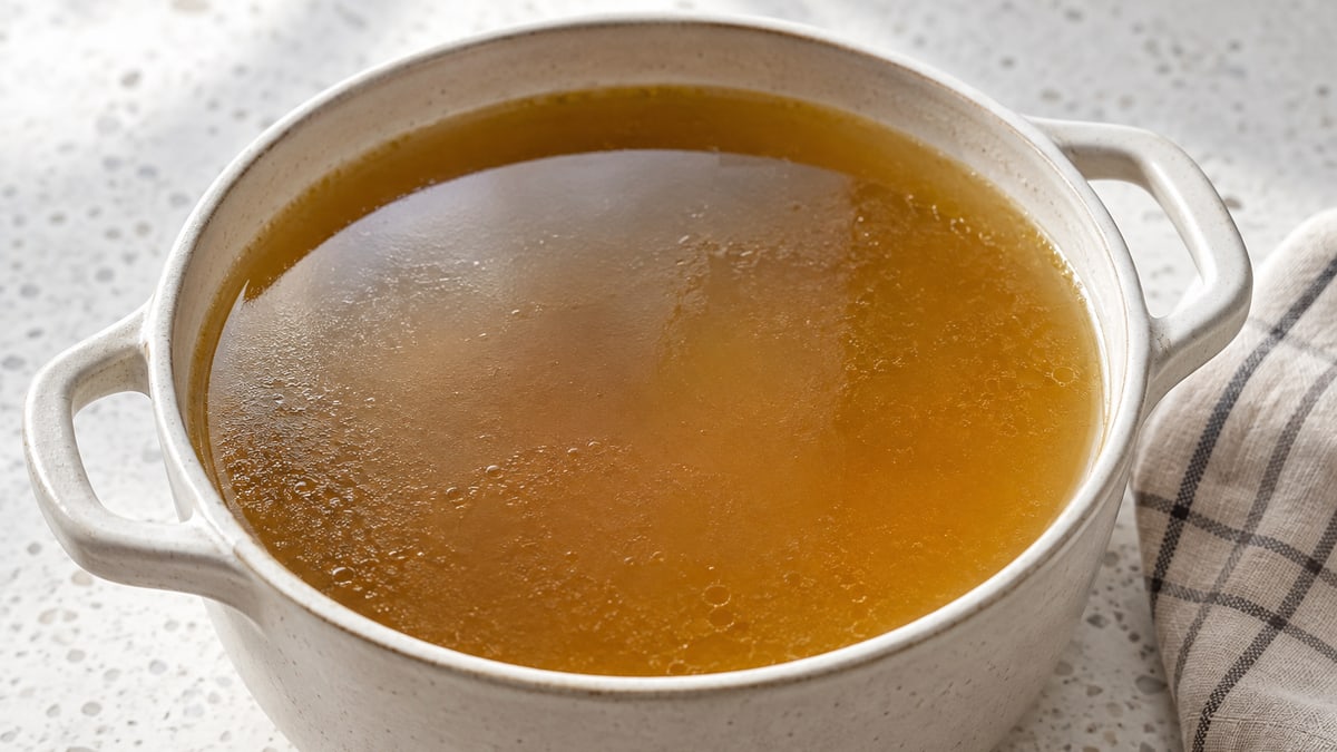 Vegetable Stock, cooked and served. A generated image, not a photograph.